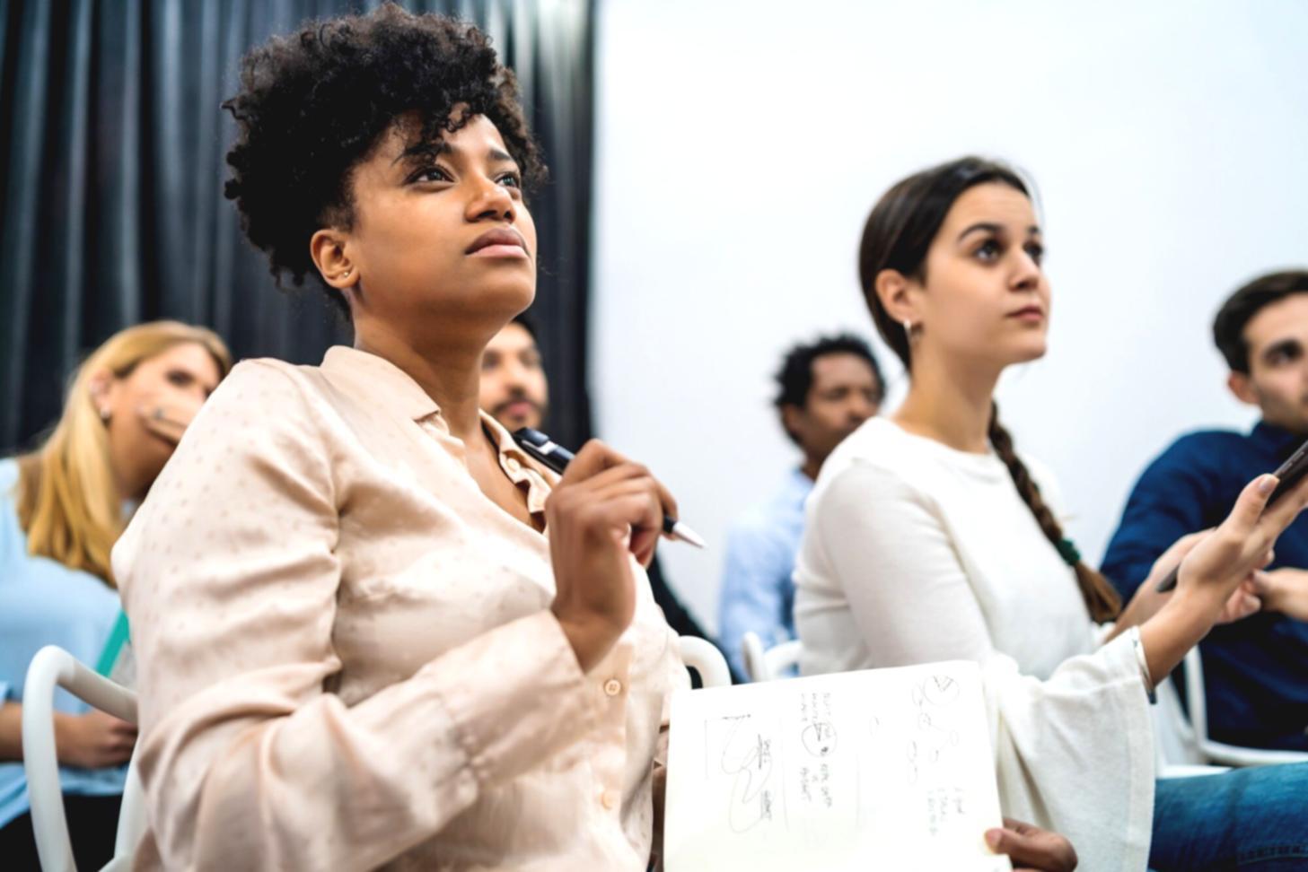 Financial planning workspace showing budget allocation worksheets and planning materials